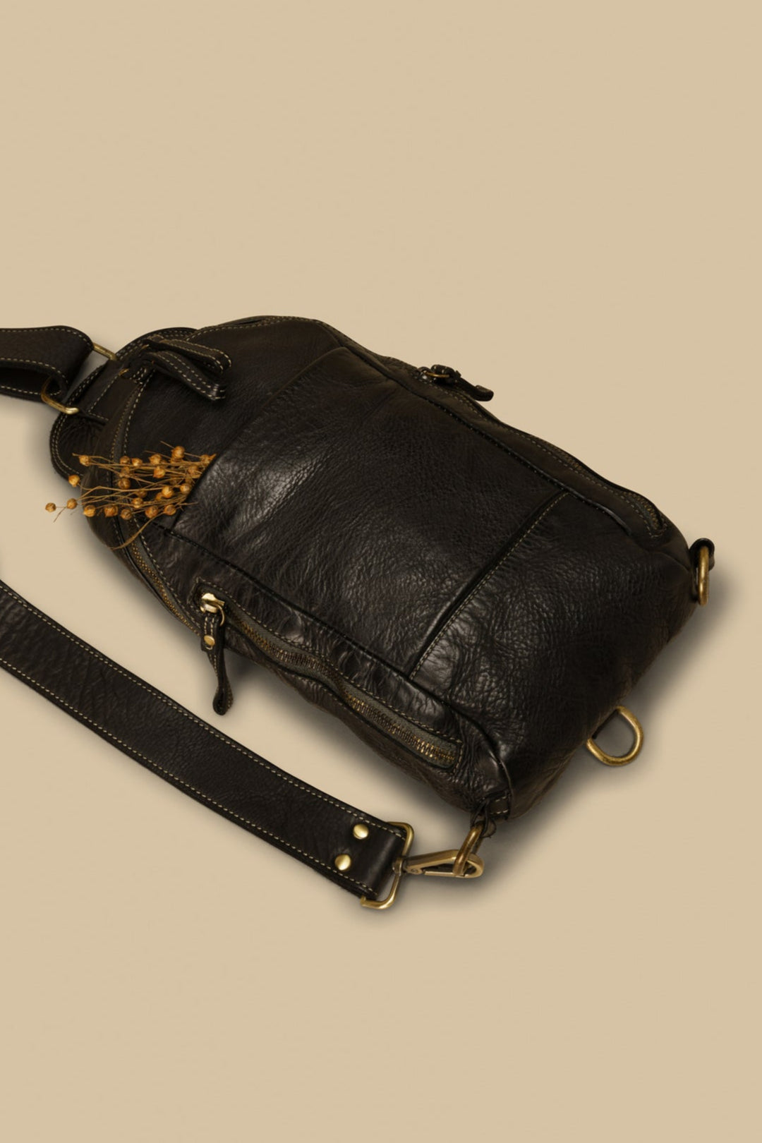 lusher movement sling bag black, coach thompson sling bag, coach leather sling bags, vintage leather sling bags, black leather sling,