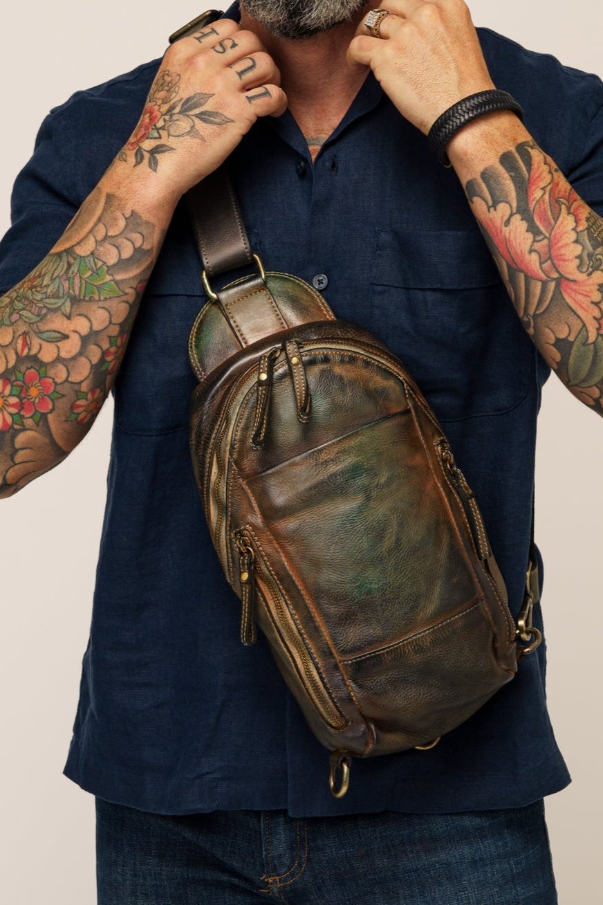 designer sling backpack leather Movement Sling Bag - Petrol