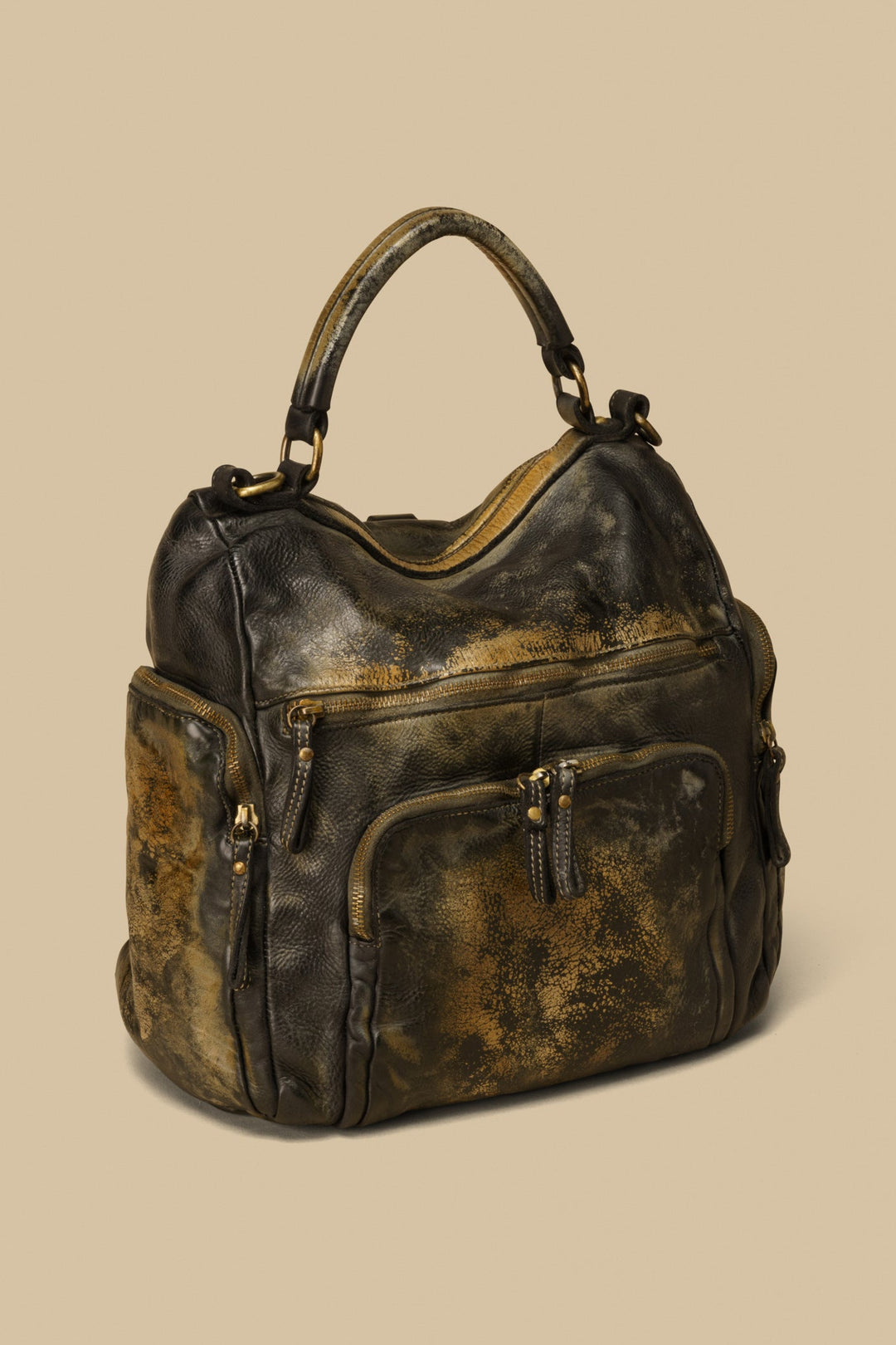 lusher quest backpack purse raw onyx, black vintage leather backpack, luxury leather backpack, backpack with pockets, campomaggi backpack, free people backpack, bolsa nova mia backpack. momma mia backpack, soft slouchy backpack