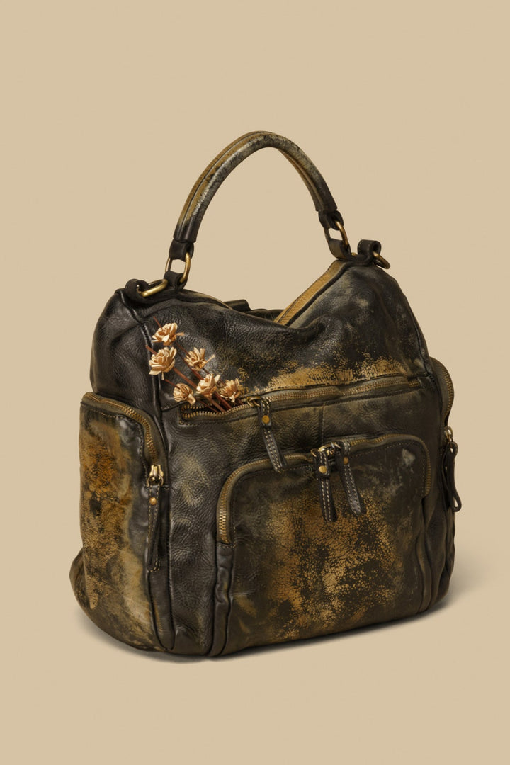 lusher quest backpack purse raw onyx, black vintage leather backpack, luxury leather backpack, backpack with pockets, campomaggi backpack, free people backpack, bolsa nova mia backpack. momma mia backpack, soft slouchy backpack