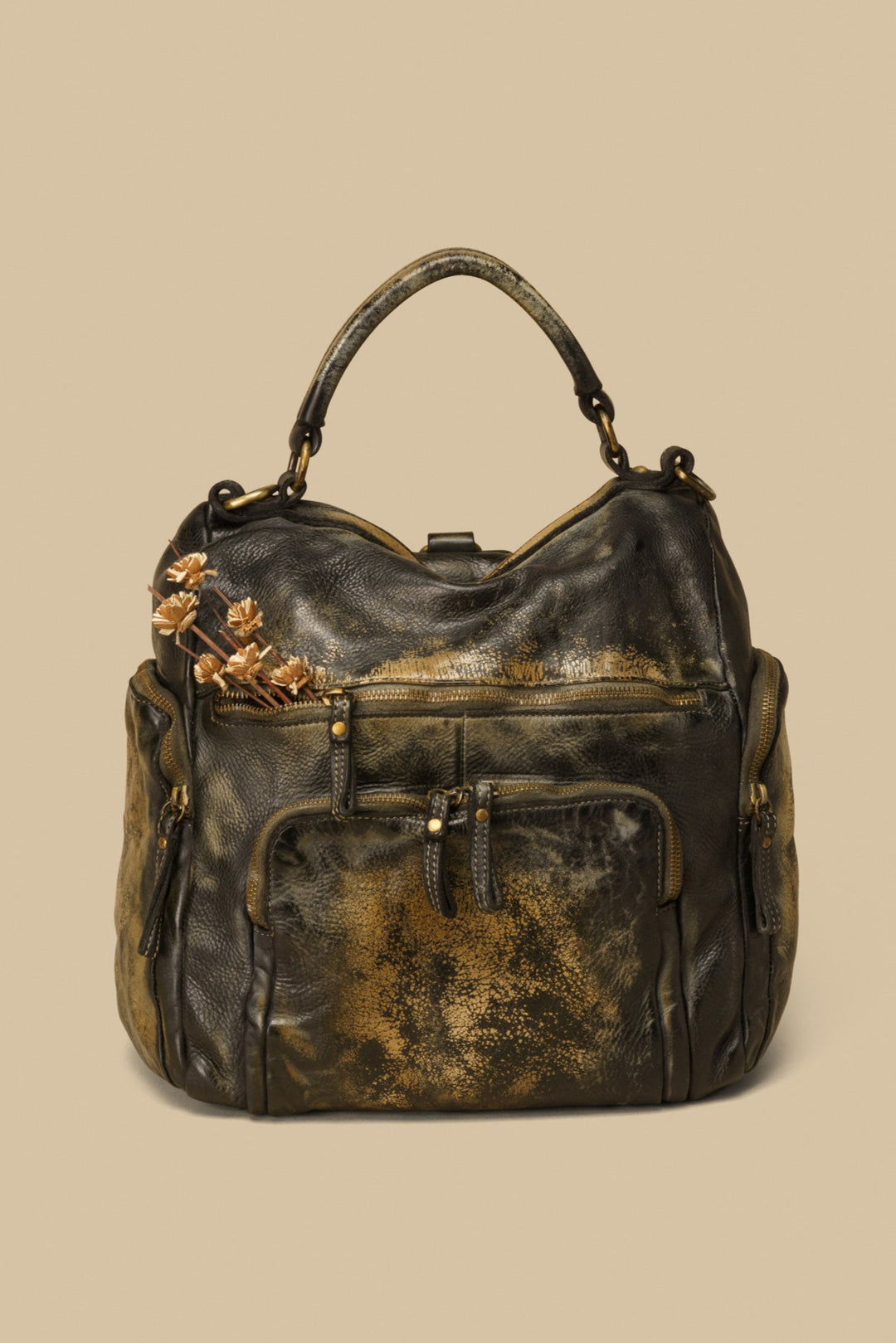 lusher quest backpack purse raw onyx, black vintage leather backpack, luxury leather backpack, backpack with pockets, campomaggi backpack, free people backpack, bolsa nova mia backpack. momma mia backpack, soft slouchy backpack