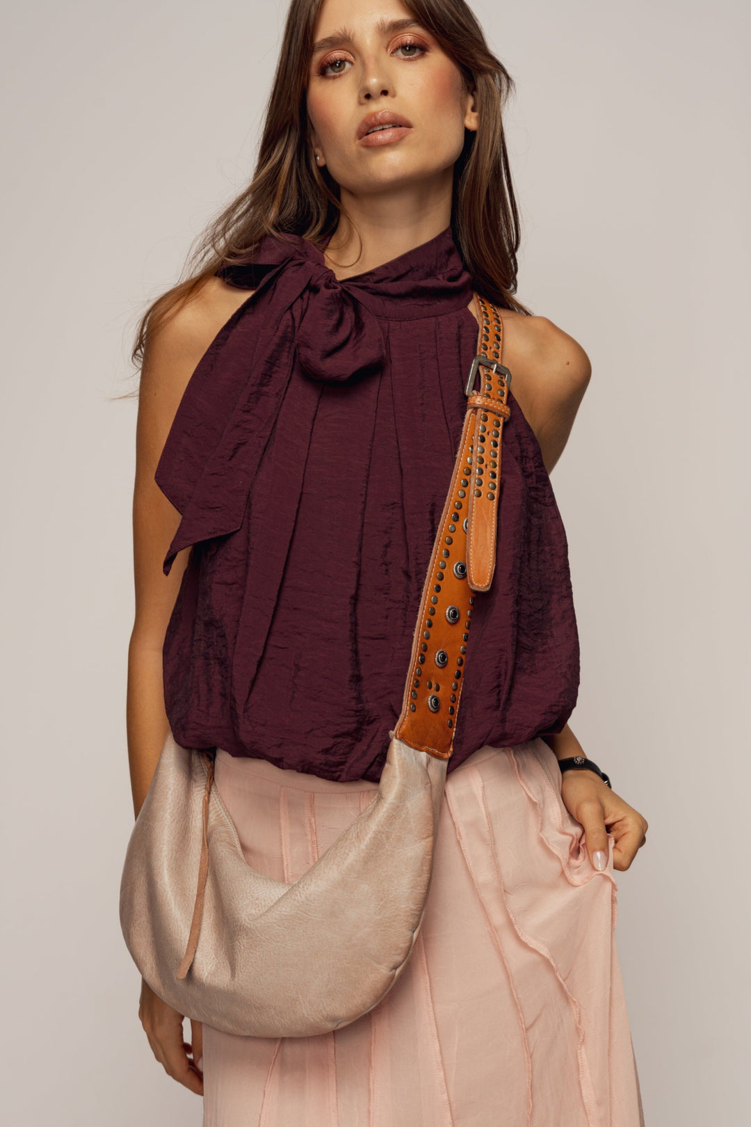 LUSHER MUSE SLING BAG, LUSHER BLUSH SLING BAG, LUSHER LEATHER SLING BAGS, BLUSH PINK LEATHER SLING BAG, STUDDED LEATHER SLING BAG, LUXURY FEMININE SLING BAG