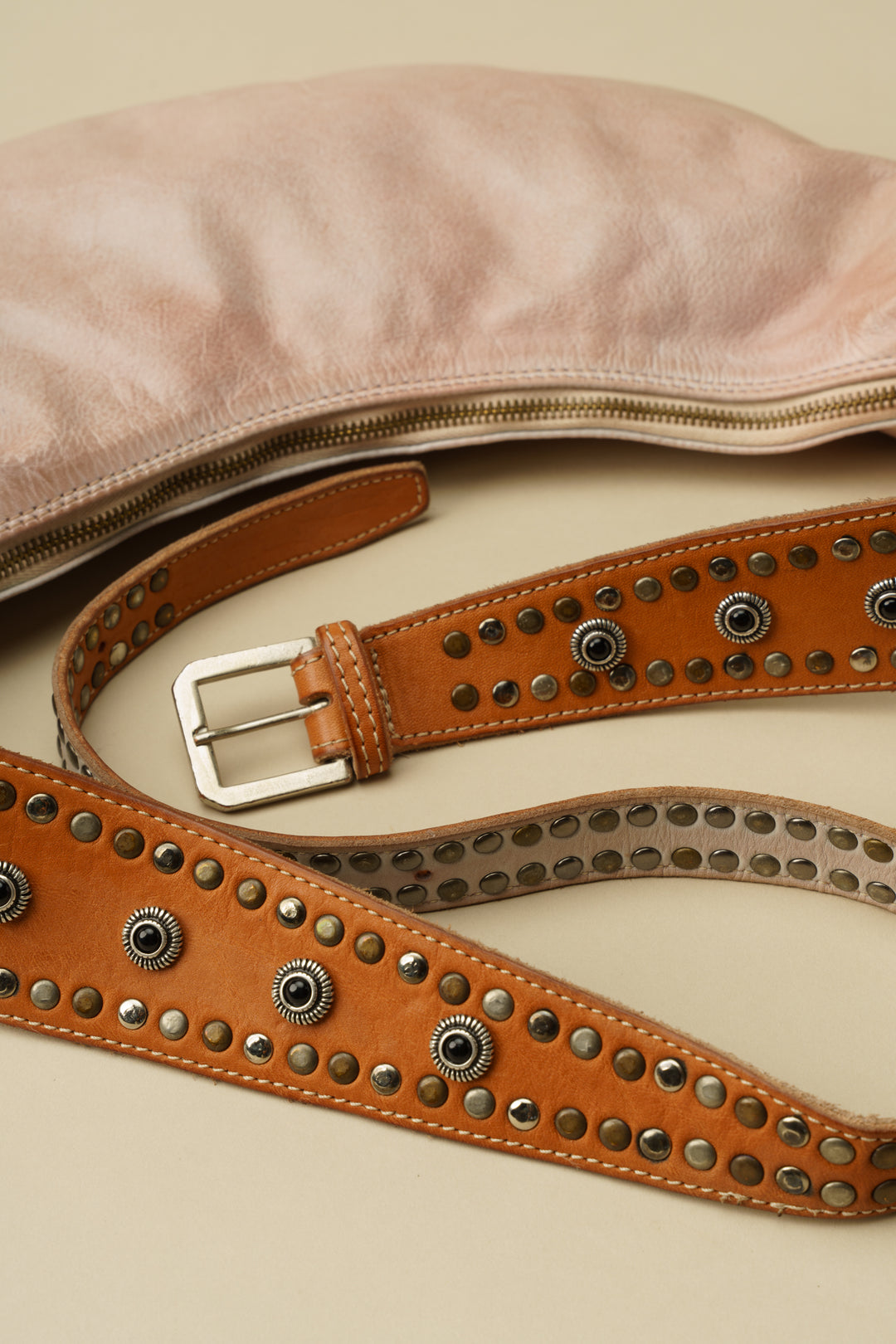 LUSHER MUSE SLING BAG, LUSHER BLUSH SLING BAG, LUSHER LEATHER SLING BAGS, BLUSH PINK LEATHER SLING BAG, STUDDED LEATHER SLING BAG, LUXURY FEMININE SLING BAG