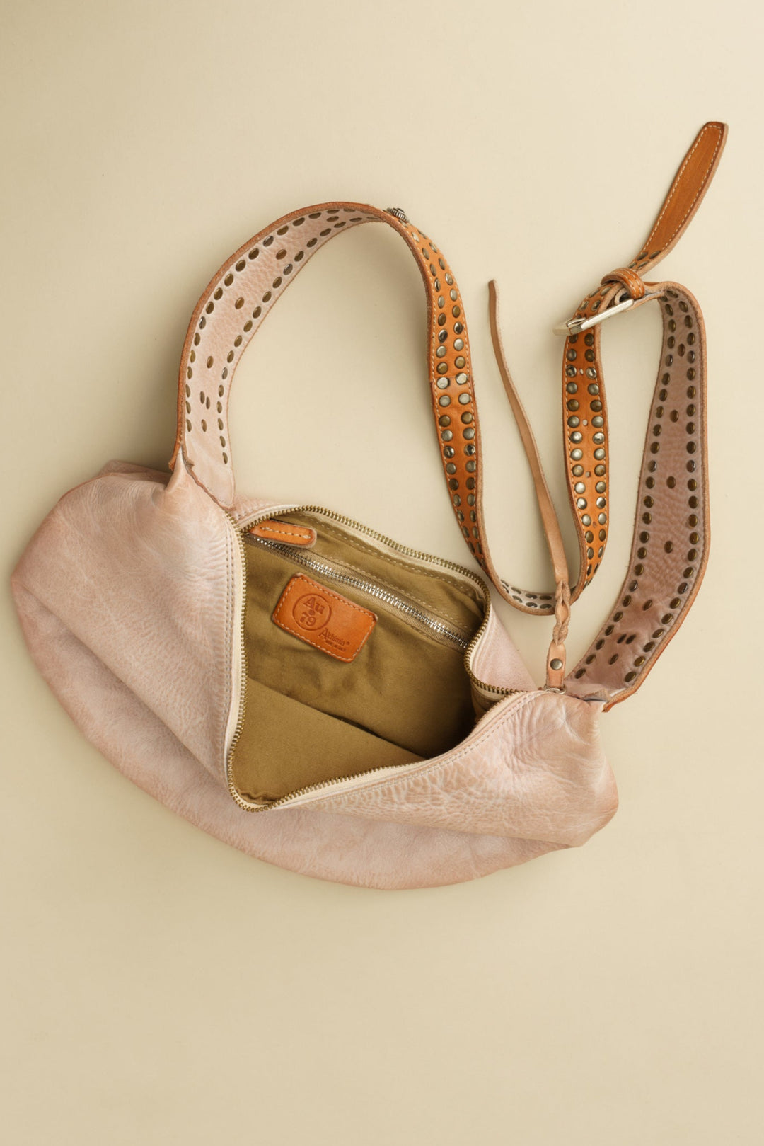 LUSHER MUSE SLING BAG, LUSHER BLUSH SLING BAG, LUSHER LEATHER SLING BAGS, BLUSH PINK LEATHER SLING BAG, STUDDED LEATHER SLING BAG, LUXURY FEMININE SLING BAG