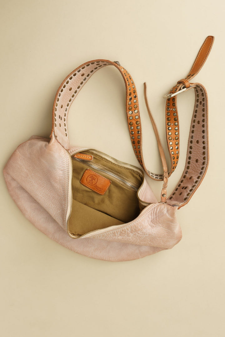 LUSHER MUSE SLING BAG, LUSHER BLUSH SLING BAG, LUSHER LEATHER SLING BAGS, BLUSH PINK LEATHER SLING BAG, STUDDED LEATHER SLING BAG, LUXURY FEMININE SLING BAG