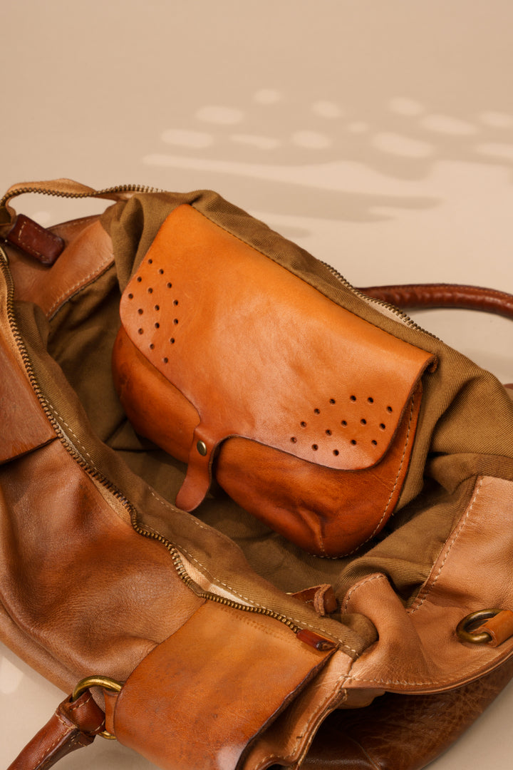 BELTED TOTE - COGNAC | LUSHER Interior photo showing leather pocket
