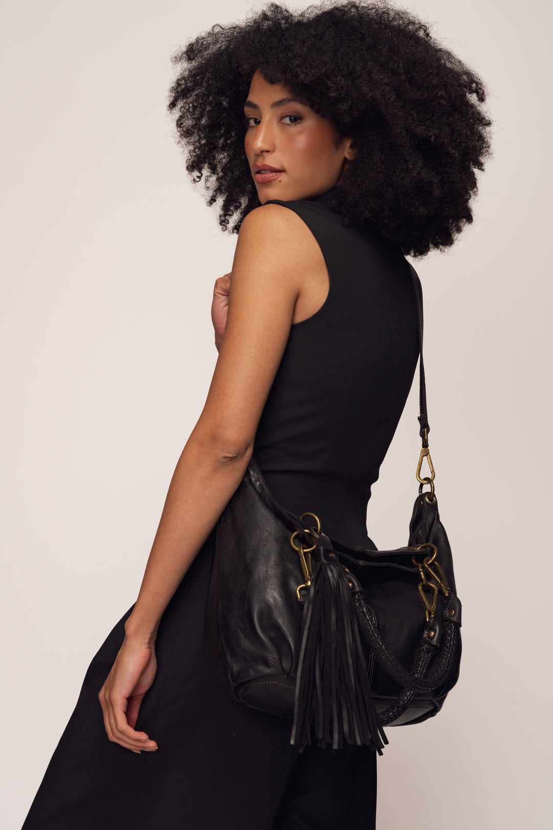Calla Lily Convertible Hobo  - Black | LUSHER ,Model wearing crossbody