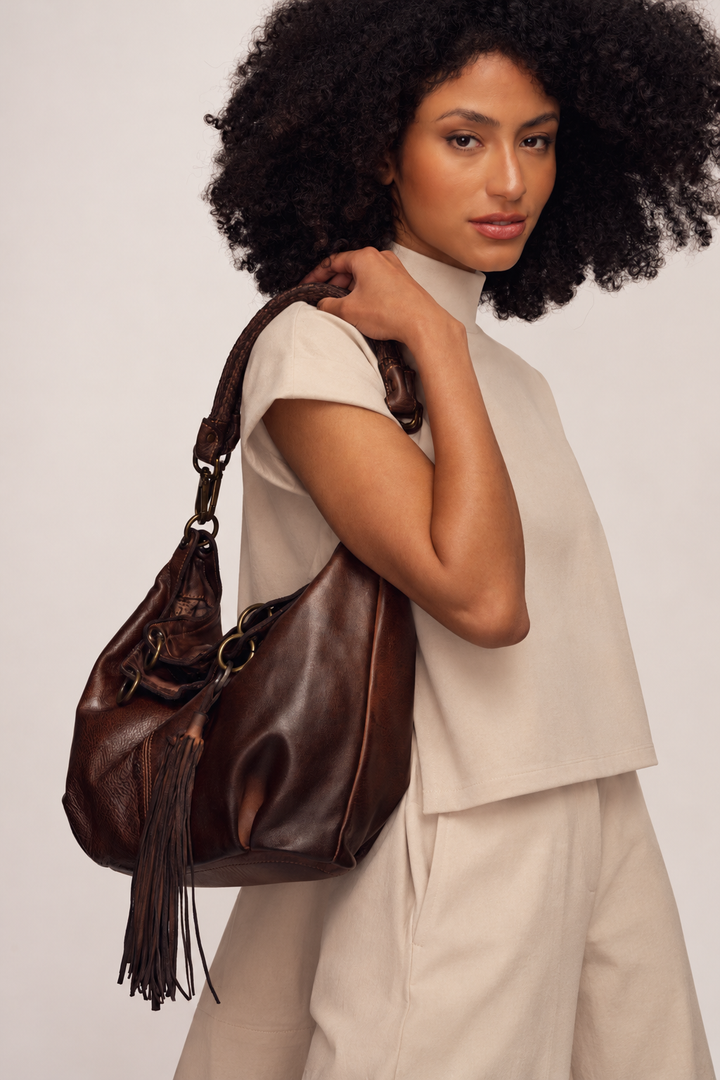 LUSHER CALLA LILY CONVERTIBLE HOBO IN CHOCOLATE BROWN WORN AS A SOFT SLOUCHY HOBO