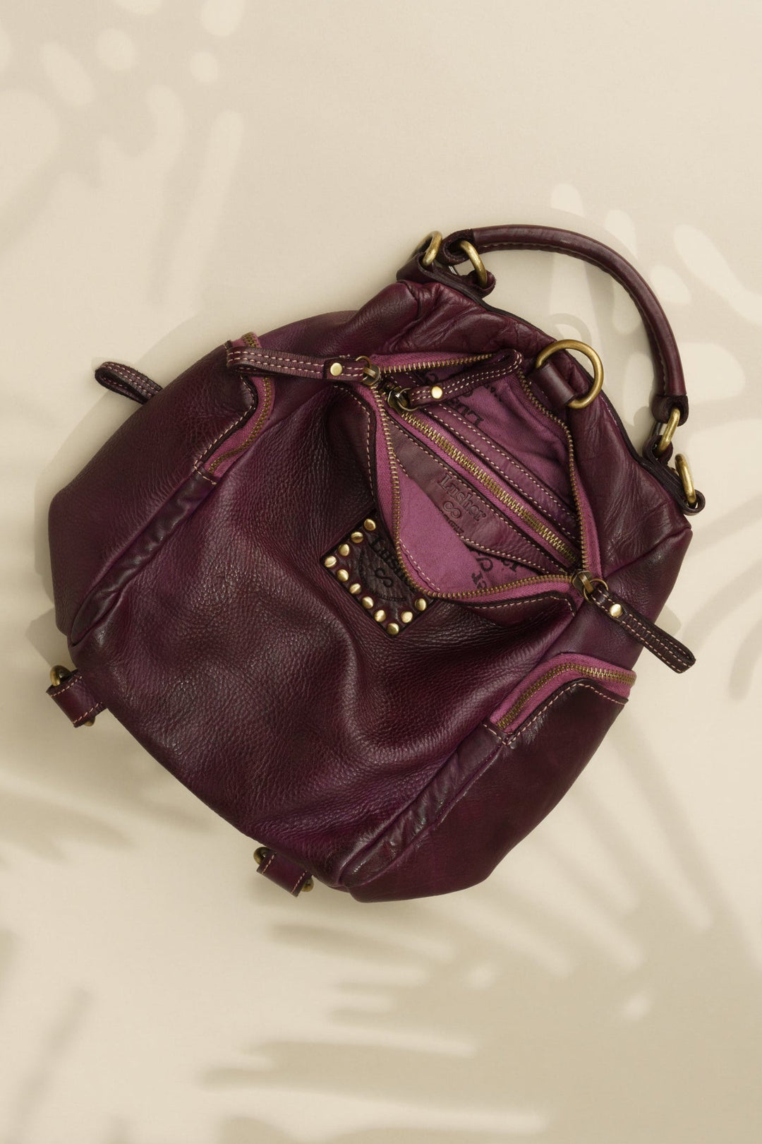 LUSHER MINI QUEST BACKPACK PURSE - PLUM 