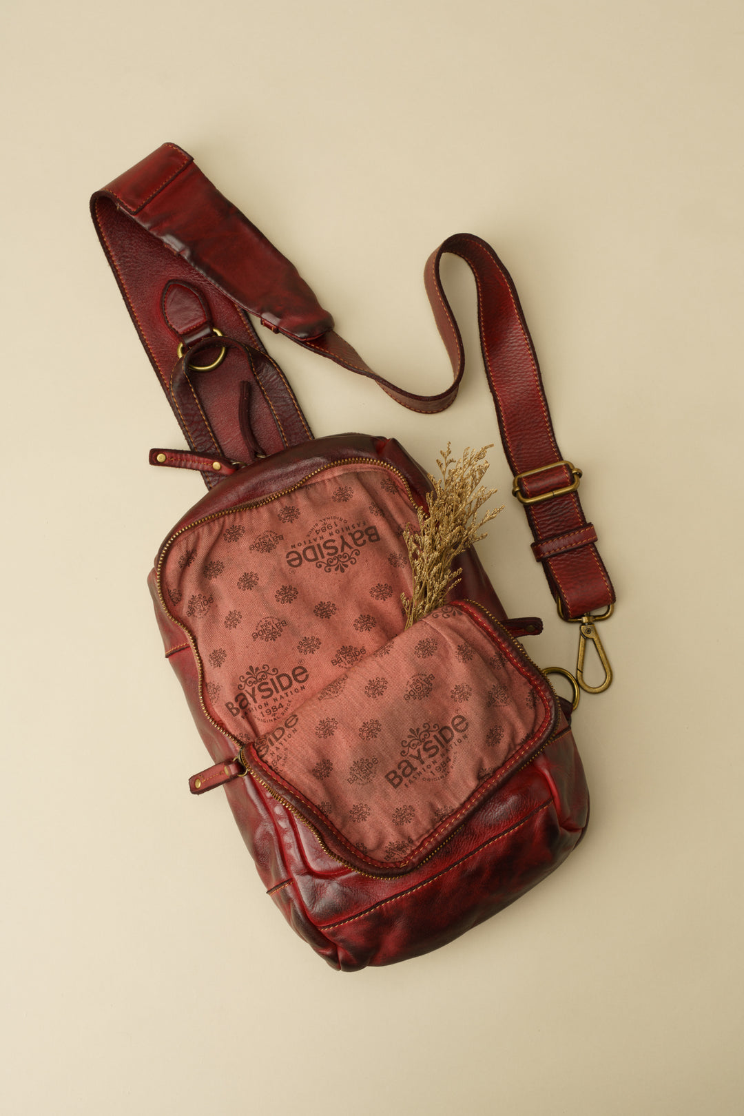 LUSHER MODENA SLING BAG, bordeaux leather sling bag, soft slouchy leather sling bag, vintage leather sling bags, lusher leather sling bags