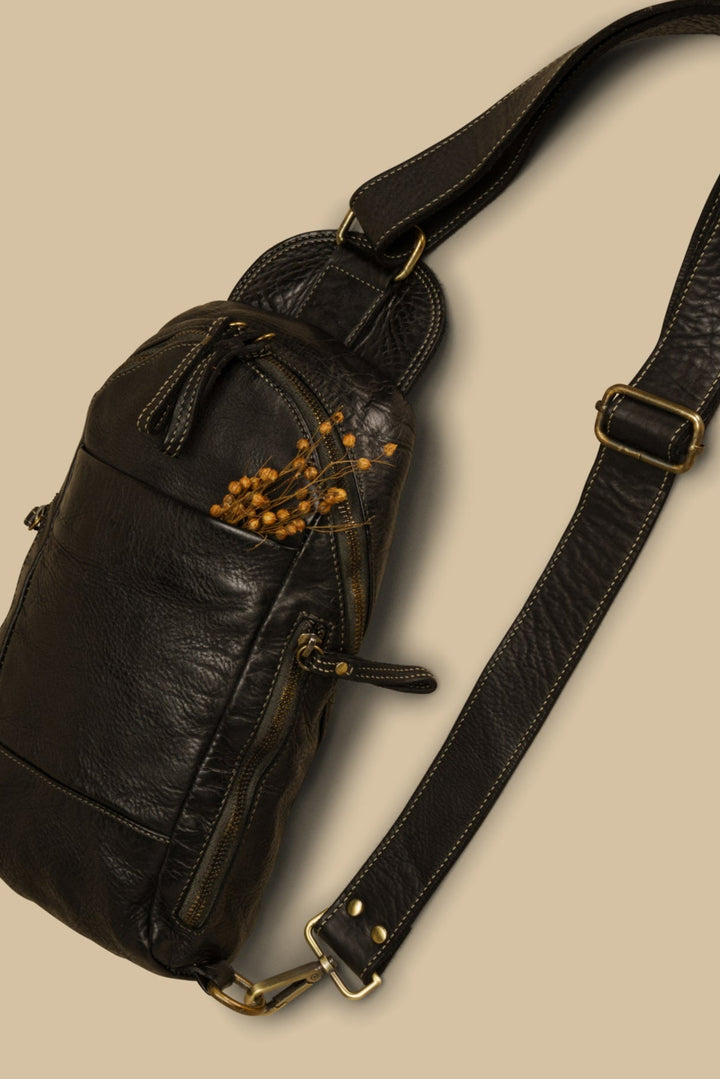 lusher movement sling bag black, coach thompson sling bag, coach leather sling bags, vintage leather sling bags, black leather sling, 