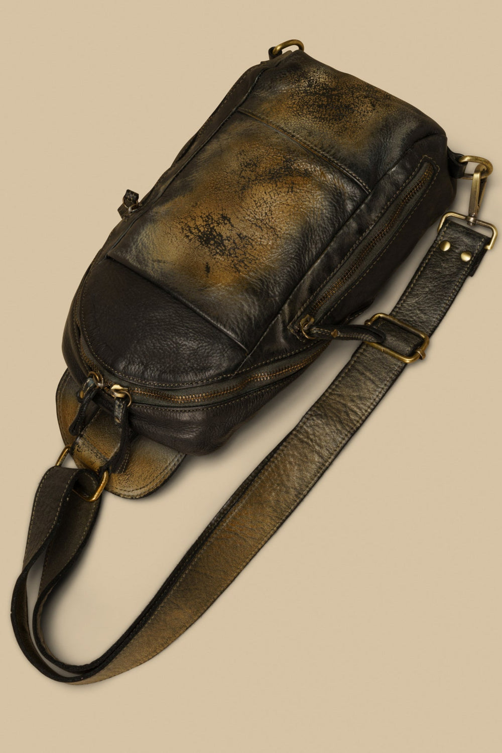 lusher movement sling bag raw onyx, coach thompson sling bag, coach leather sling bags, vintage leather sling bags, black leather sling, 