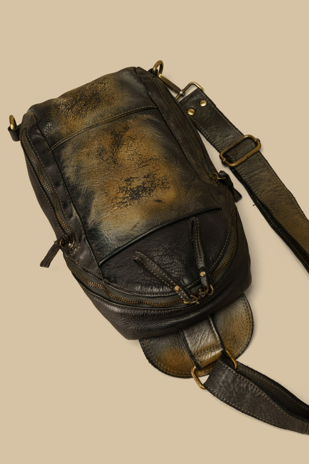 lusher movement sling bag raw onyx, coach thompson sling bag, coach leather sling bags, vintage leather sling bags, black leather sling, 