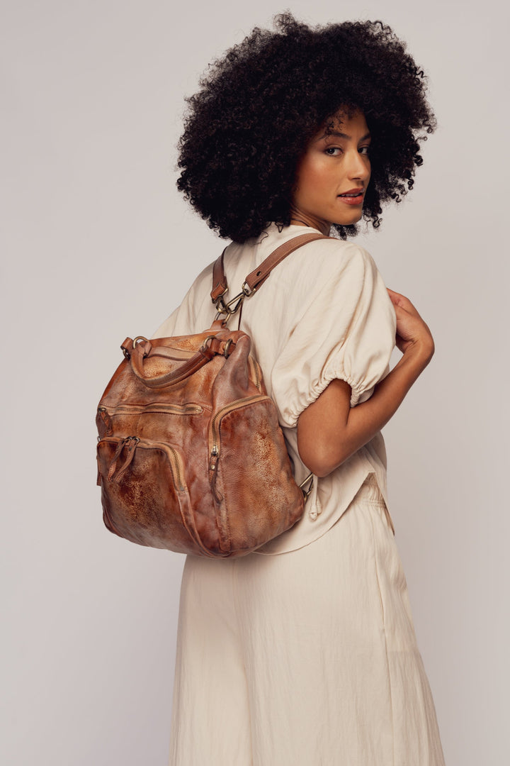 lusher quest backpack purse in gold cognac, soft slouchy leather backpack purse, leather backpack with exterior zip pockets, luxury Italian leather backpack, travel backpack