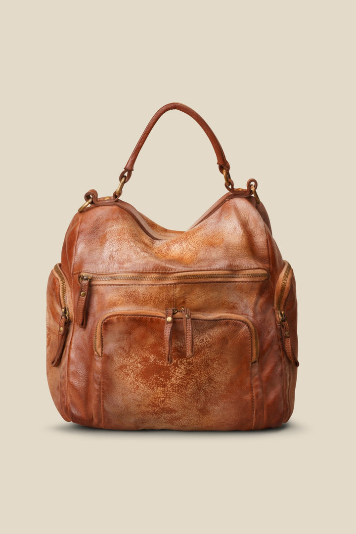 lusher quest backpack purse in gold cognac, soft slouchy leather backpack purse, leather backpack with exterior zip pockets, luxury Italian leather backpack, travel backpack