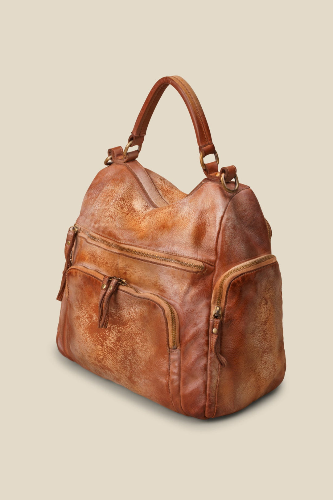 lusher quest backpack purse in gold cognac, soft slouchy leather backpack purse, leather backpack with exterior zip pockets, luxury Italian leather backpack, travel backpack