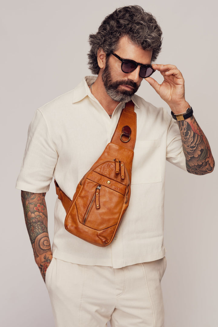 LUSHER MEN'S ROAM SLING BAG COGNAC, LUSHER + BAYSIDE84 COGNAC, MEN'S COGNAC LEATHER SLING BAG, SOFT SLOUCHY BOHO CROSSBODY SLING BAG, BUTTERY SOFT LEATHER SLING BAG, MEN'S ITALIAN LEATHER SLING BAG