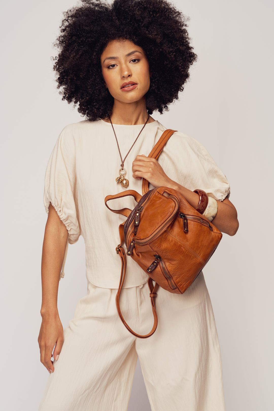 LUSHER SOFT AND SLOUCHY SMALL BACKPACK IN COGNAC, LUSHER + BAYSIDE84 COLLAB COLLECTION SOFT AND SLOUCHY SMALL BACKPACK, MINI LEATHER BACKPACK PURSE BY LUSHER.co