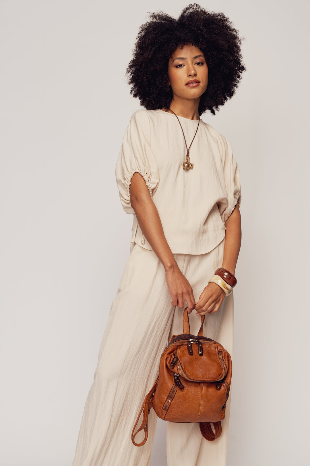 LUSHER SOFT AND SLOUCHY SMALL BACKPACK IN COGNAC, LUSHER + BAYSIDE84 COLLAB COLLECTION SOFT AND SLOUCHY SMALL BACKPACK, MINI LEATHER BACKPACK PURSE BY LUSHER.co