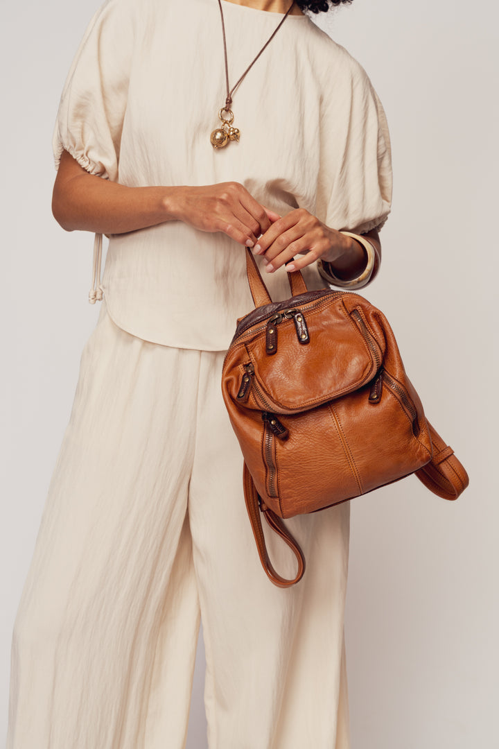 LUSHER SOFT AND SLOUCHY SMALL BACKPACK IN COGNAC, LUSHER + BAYSIDE84 COLLAB COLLECTION SOFT AND SLOUCHY SMALL BACKPACK, MINI LEATHER BACKPACK PURSE BY LUSHER.co