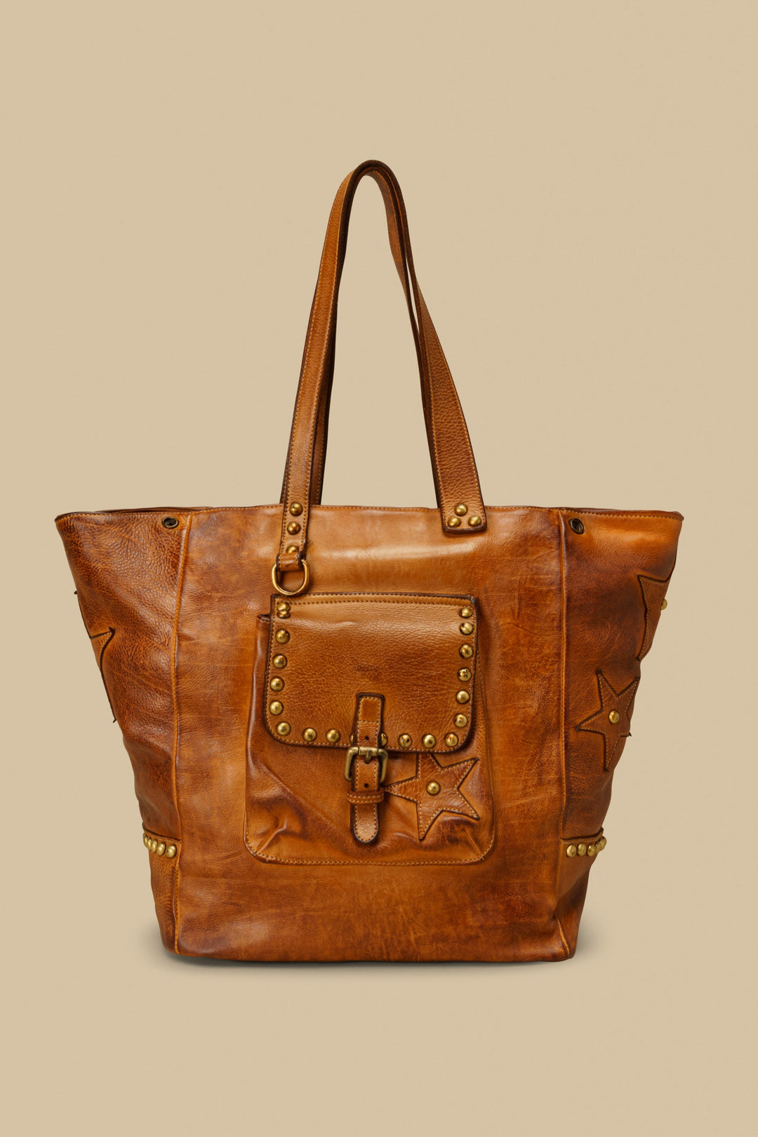 LUSHER STAR TOTE IN COGNAC, LARGE LEATHER TOTE WITH STARS AND STUDS, STUDDED LEATHER TOTE BAG, STAR PURSE, PURSE WITH STARS, FREE PEOPLE TOTE BAG WITH STARS, 