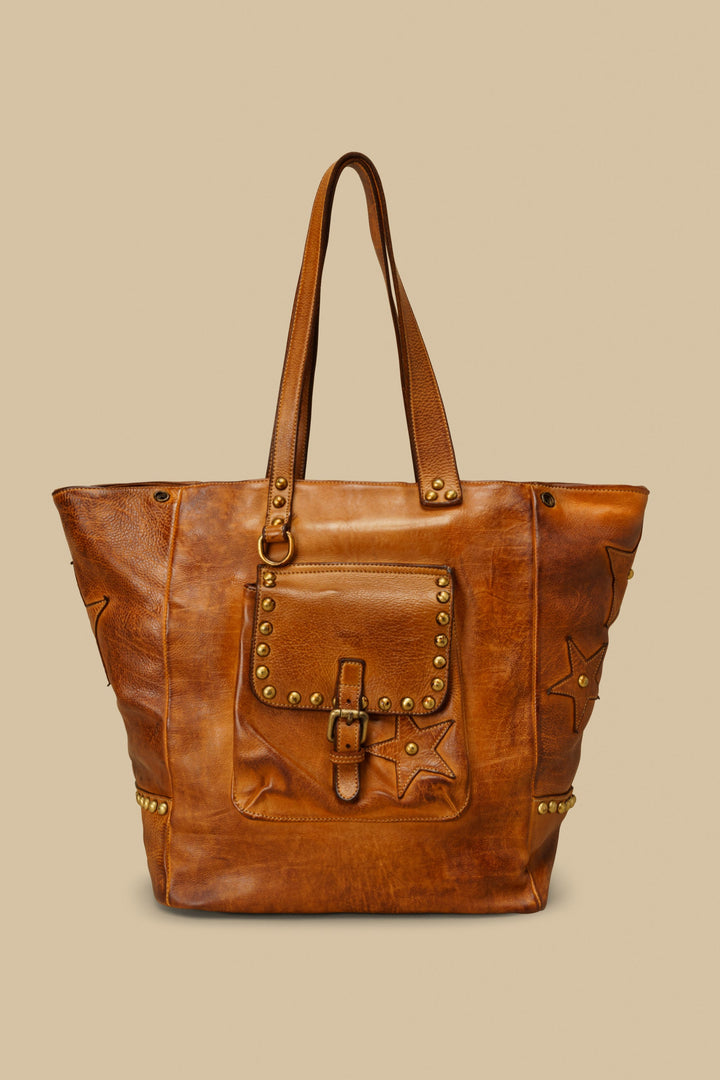 LUSHER STAR TOTE IN COGNAC, LARGE LEATHER TOTE WITH STARS AND STUDS, STUDDED LEATHER TOTE BAG, STAR PURSE, PURSE WITH STARS, FREE PEOPLE TOTE BAG WITH STARS, 