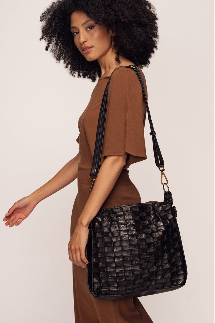 Siena Handwoven Leather Shoulder & Crossbody Bag - Black | LUSHER - Model wearing with long shoulder strap