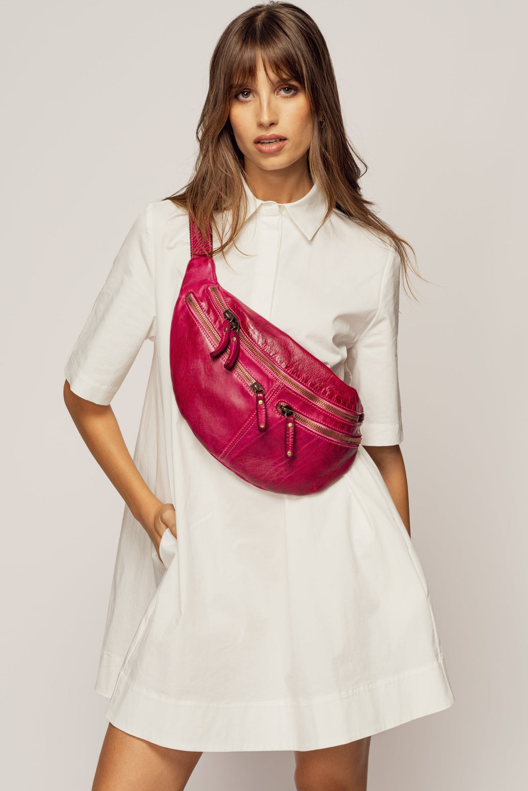 LUSHER SMALL URBAN SLING BAG FUCHSIA