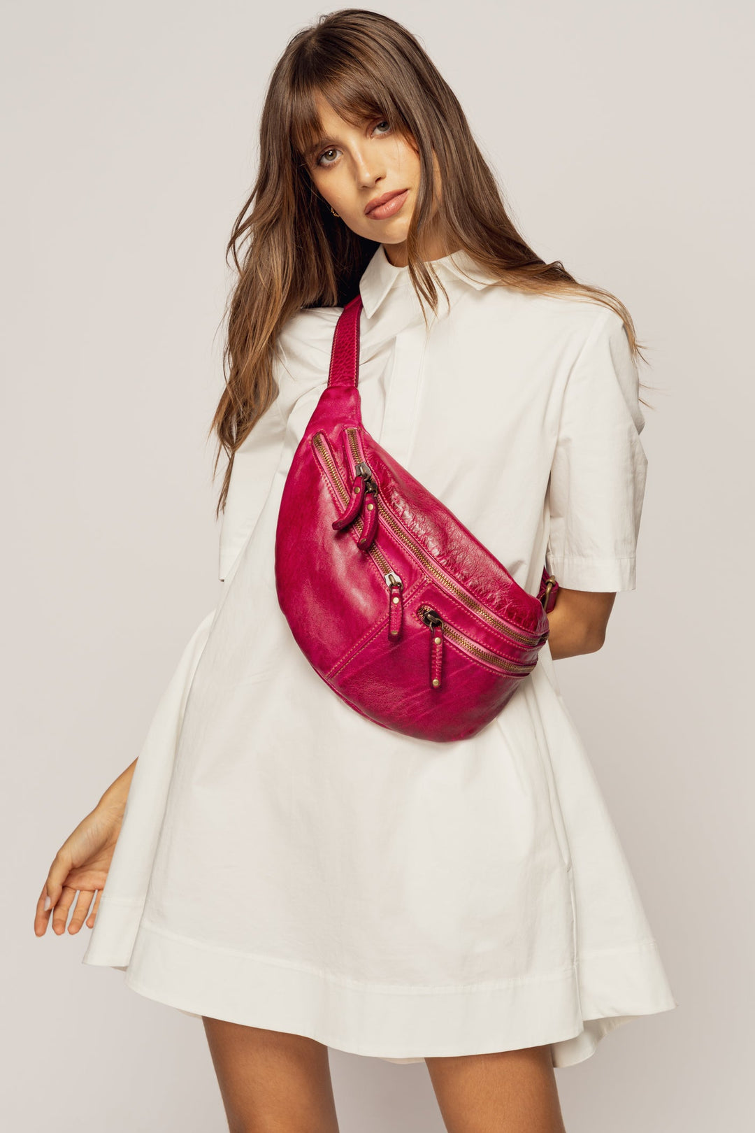 LUSHER SMALL URBAN SLING BAG FUCHSIA