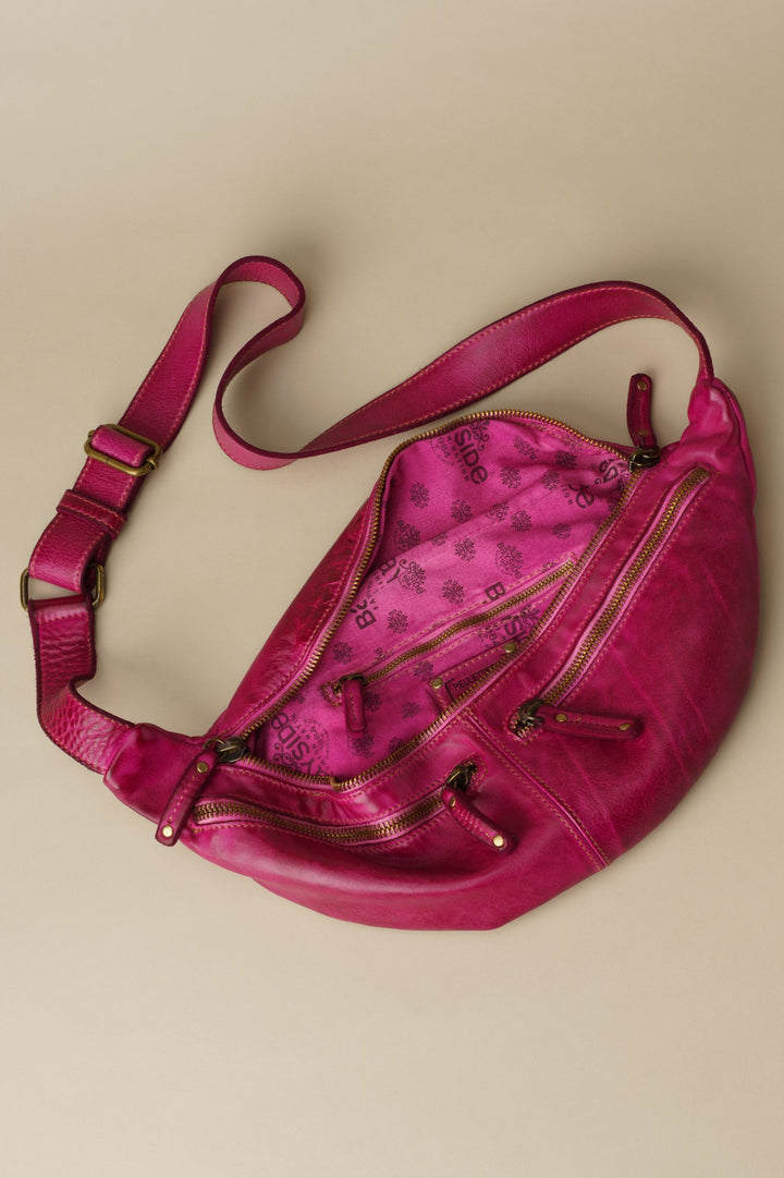 LUSHER SMALL URBAN SLING BAG FUCHSIA